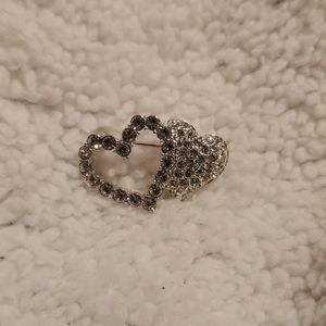 Beautiful small silver tone Rhyme stone brooch